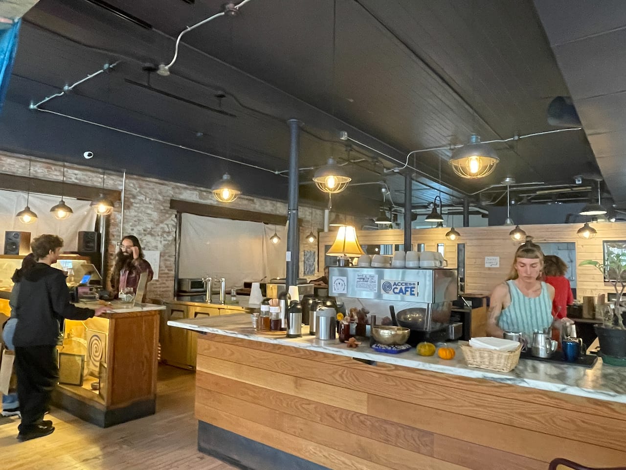 The Access Café counter and floor in use on opening day.