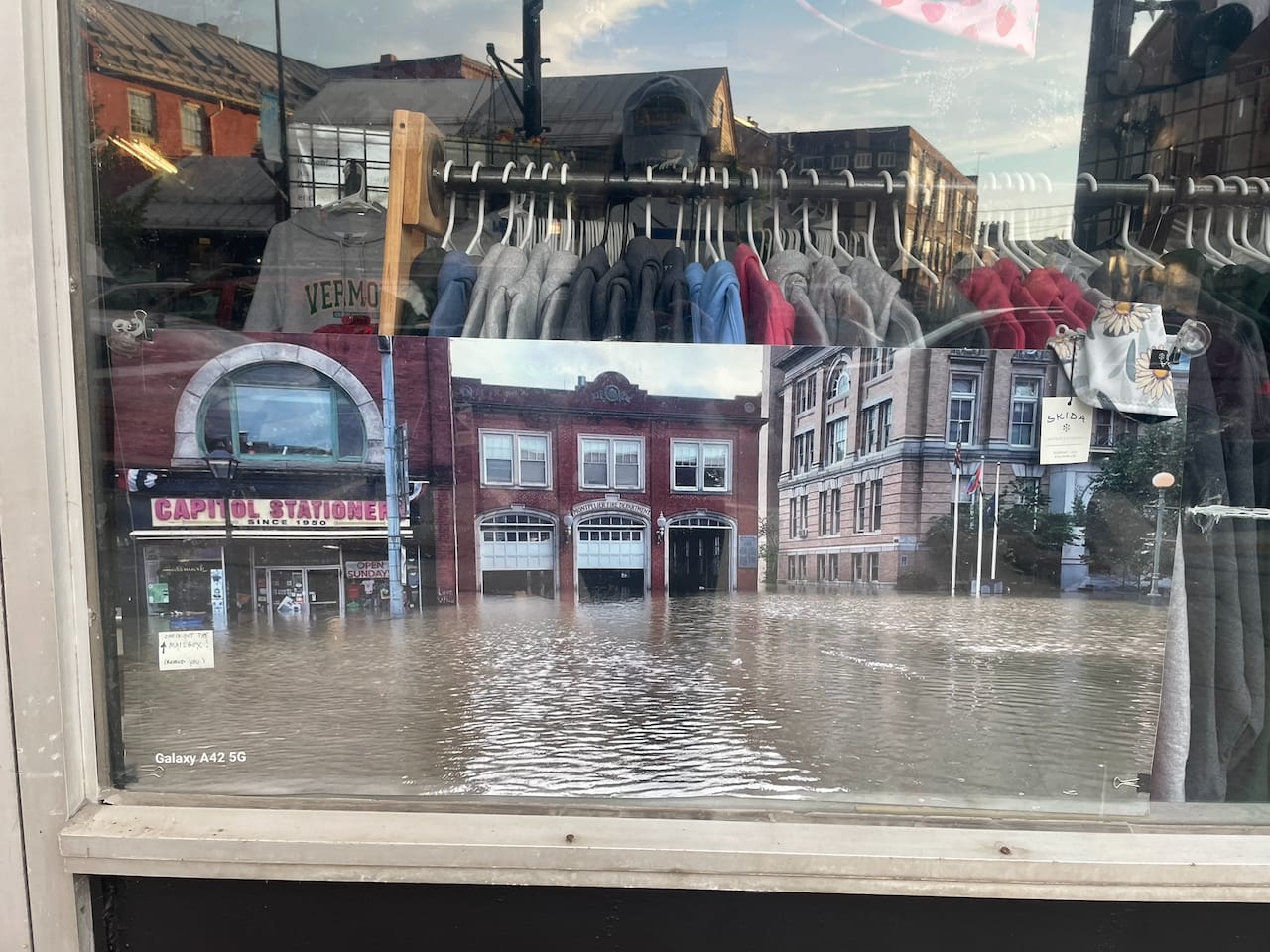 The Winooski ran down Main Street in July 2023, and the space still carried that flood when the café moved in.