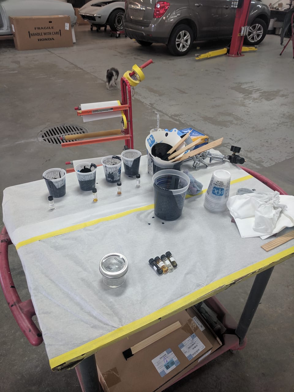 The paint and scent station. The scent was mixed into the door’s original paint before repainting, so the piece was scratch-and-sniff.