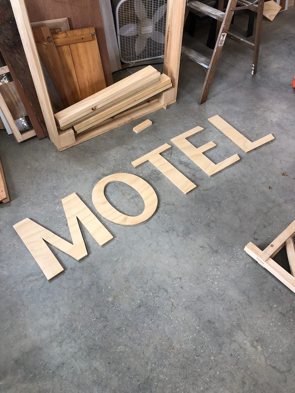 The new MOTEL letters, cut.