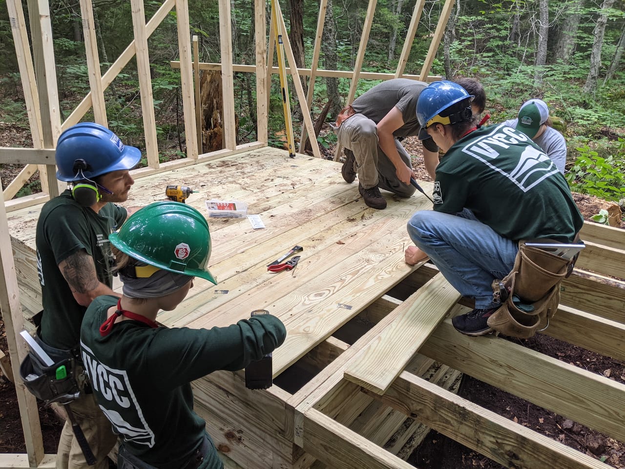 The crew building the privy platform.