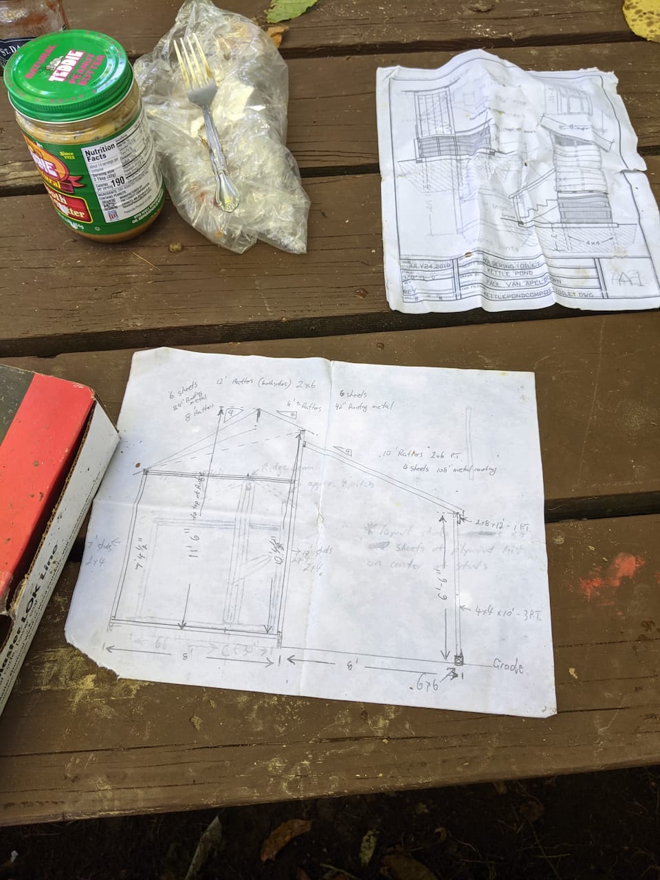The hand-drawn cabin plans on site.