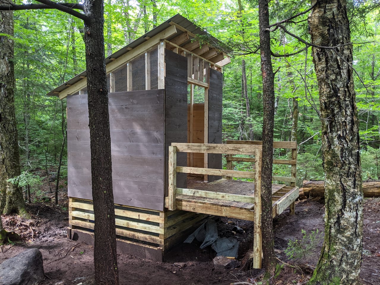 A backcountry privy under construction.
